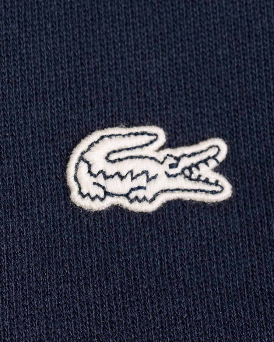 Lacoste Fairplay Sweatshirt Navy Blue Flour hos CareOfCarl.no