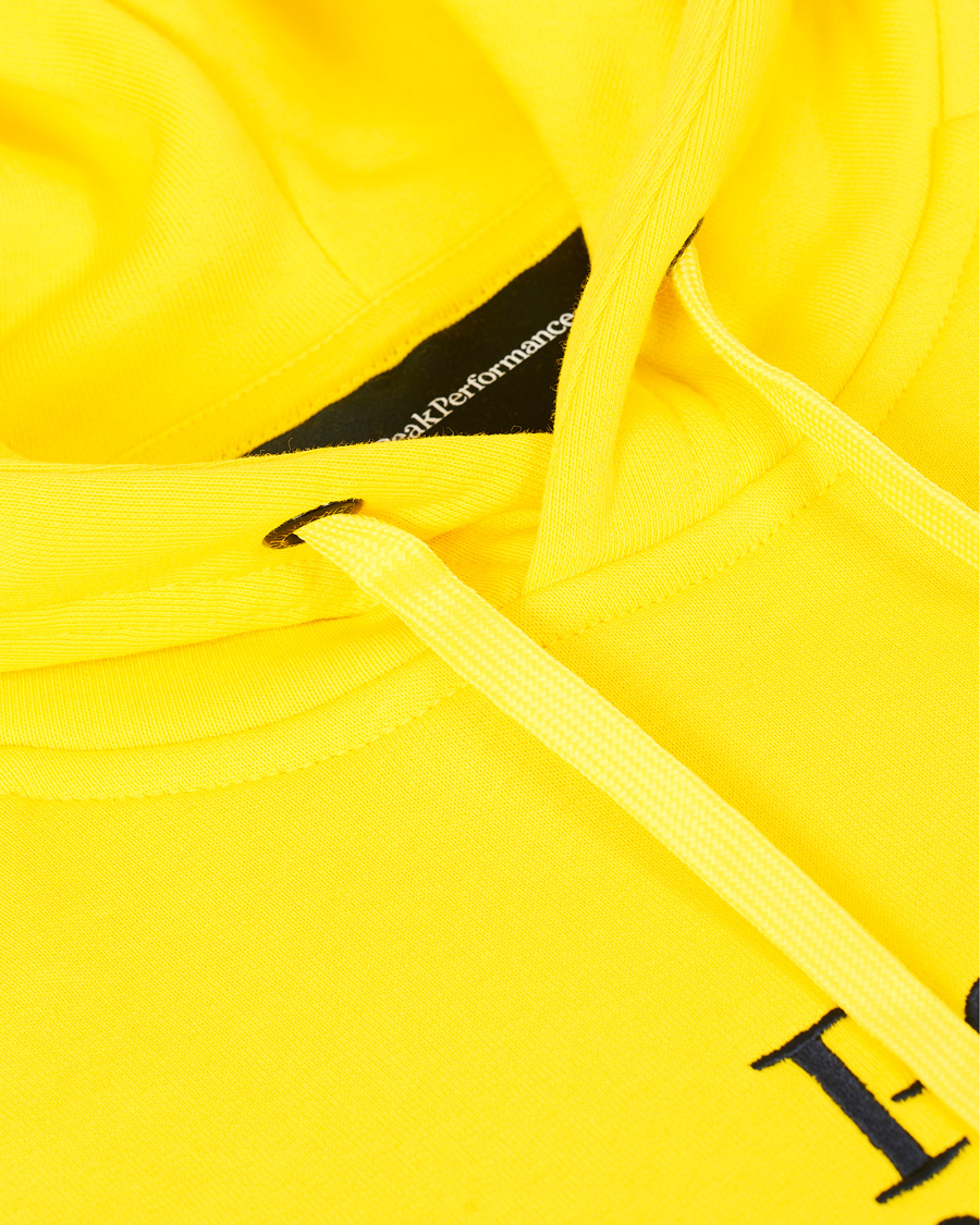 Peak performance store yellow hoodie