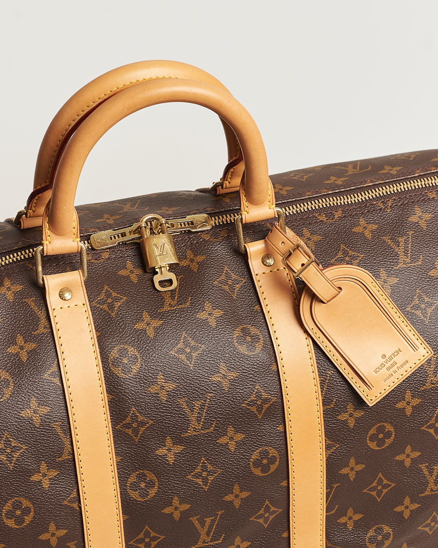 Bonhams Cars : Louis VUITTON, année 2012. Sac KeepAll 55 c en toile  Monogram et cuir naturel